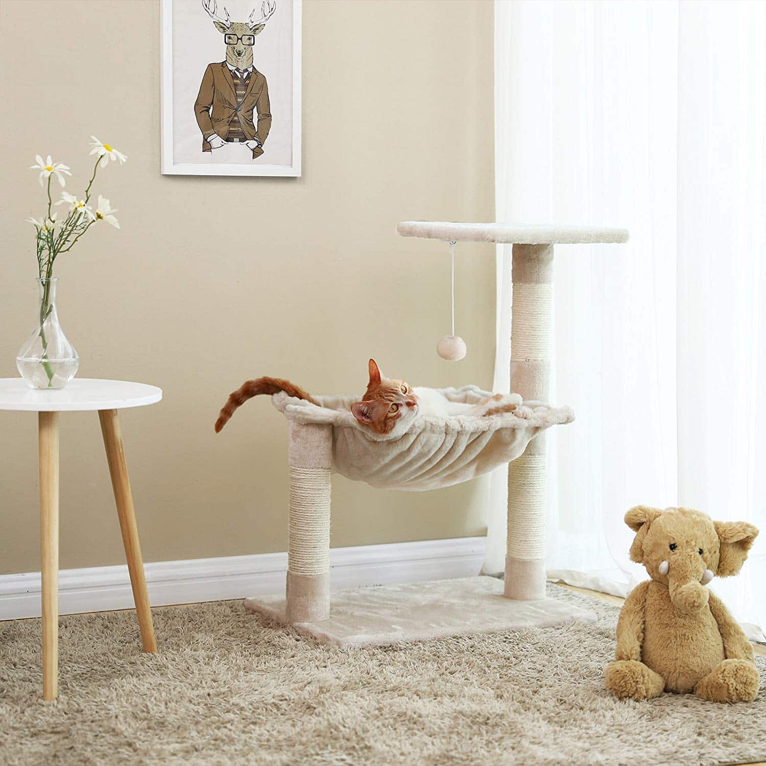 Buen acabado - Material: tablero MDF + franela + sisal + aro metálico. Columnas engrosadas (Ø 7,1 cm) para mayor estabilidad. Altura total: 70 cm. Placa base: 50 x 36 cm. Nido cuadrado: 40 x 36 x 12 cm Tapizado de alta calidad - Árbol para gatos tapizado en franela suave y hermosa, con tacto agradable, fácil de limpiar Diseño clásico - Cabe en cualquier lugar de su casa y ofrece una variedad de entrenamiento para sus gatos. Dispone de 1 nido de descanso, 1 plataforma de observación y 1 bolsa de juego. Será un maravilloso juguete divertido